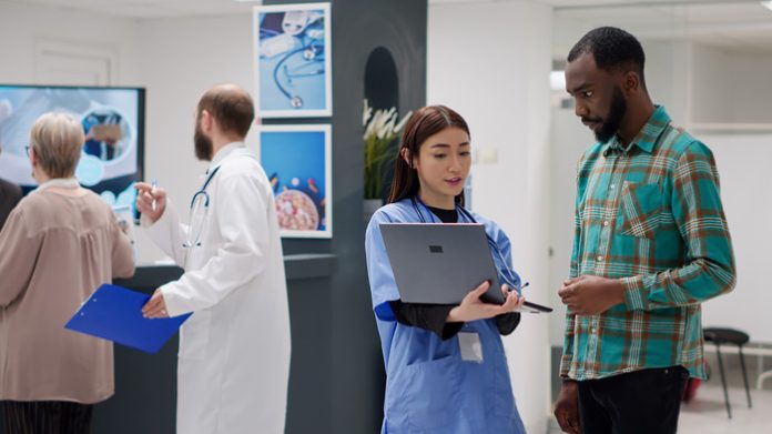 Nurse and patient talking Nurse and patient talking