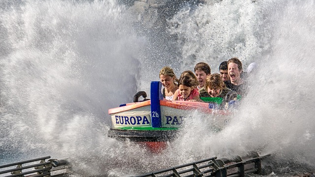 Kids and adults enjoy a thrilling splash ride at Europa-Park amusement park.