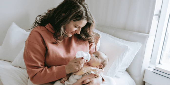 Feeding Time Made Easy with Wide Neck Bottle and Mother’s Gentle Care