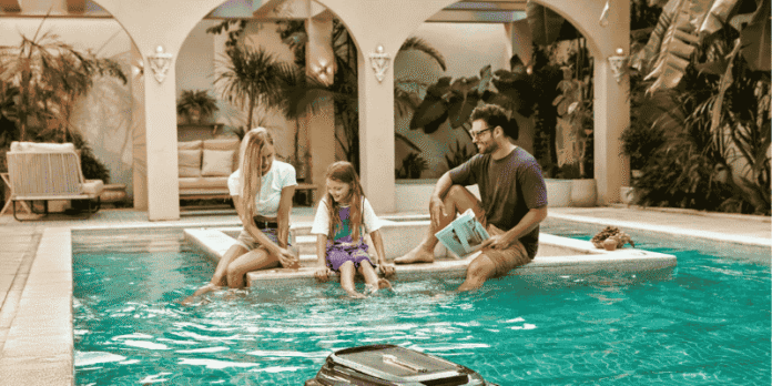 Family Enjoying Quality Time by the Pool at Home Family Enjoying Quality Time by the Pool at Home