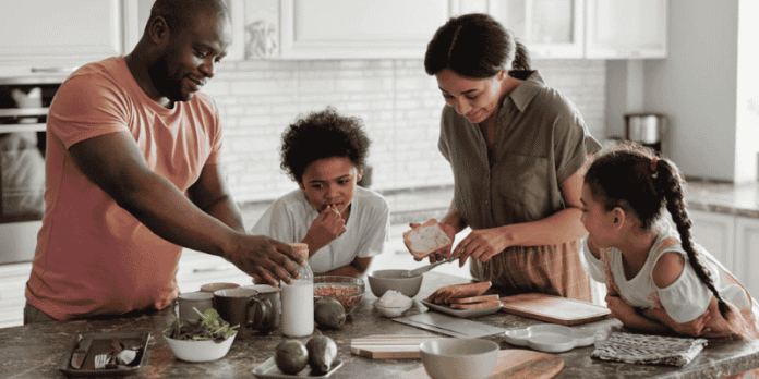 Parents and Kids Sharing a Fun Kitchen Moment Parents and Kids Sharing a Fun Kitchen Moment