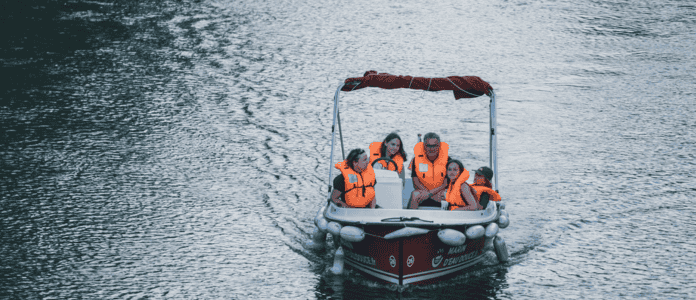 Family Enjoying a Fun Ride on an Inflatable Boat