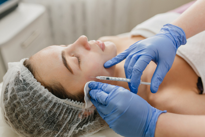 Preventative Botox Treatment for Early Anti-Aging Care Patient receiving a facial injection from a medical professional